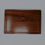 Eaglecreek Boards rectangular walnut wood cutting board with a juice groove, featuring a rich natural grain finish.