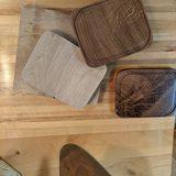 Eaglecreek Boards handcrafted solid wood cutting boards in light and dark natural grain finishes with juice grooves.