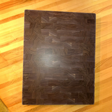 Eaglecreek Boards professional end grain hardwood cutting board with a rich dark wood mosaic pattern
