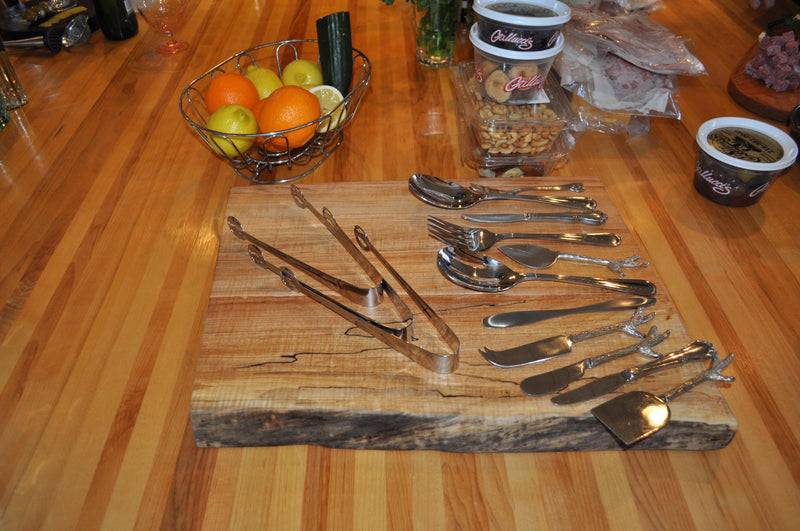 Hand carved rustic live edge maple wood cutting board